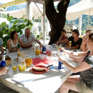 Common lunch arround the marble table.